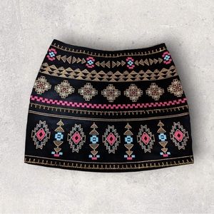 Black tribal pattern mini skirt.